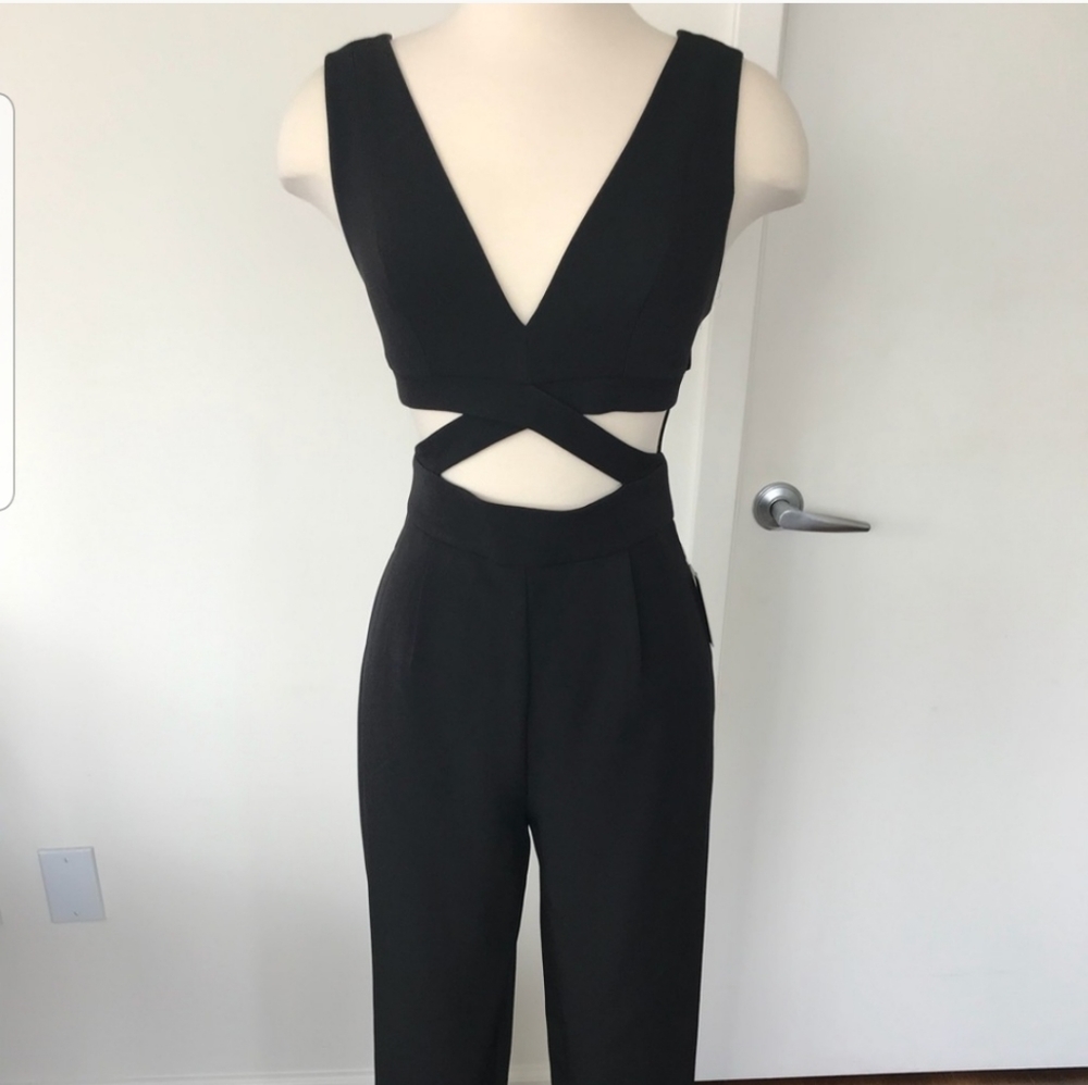 Express jumpsuit with cutouts.  0